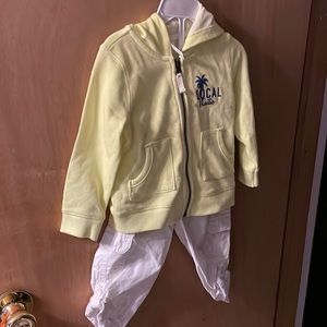 Carter’s 18 month old hoodie with white pants.